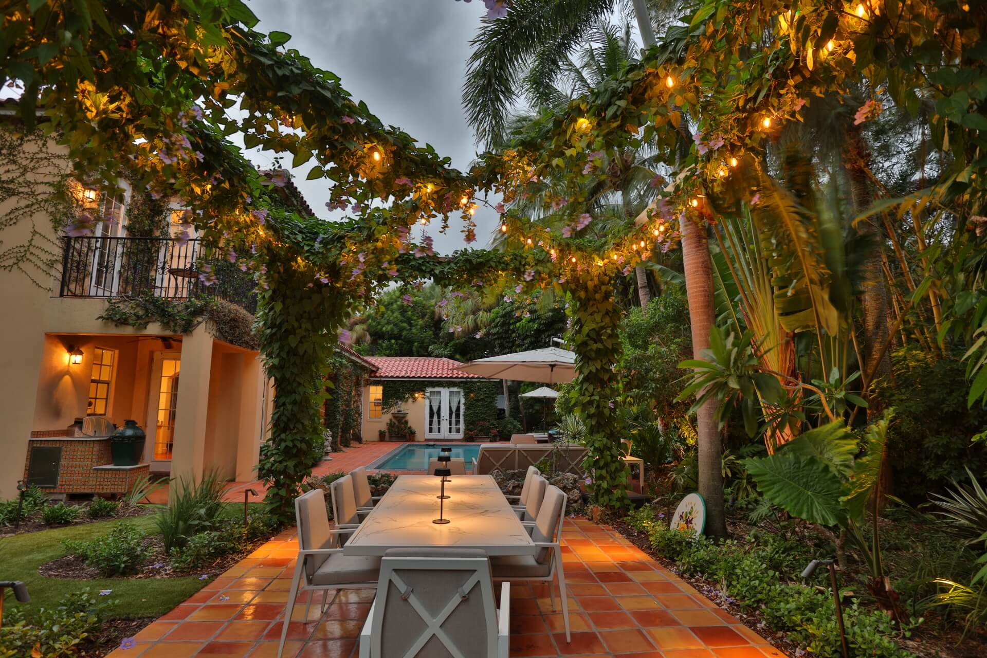 Outdoor dining area with string lights.